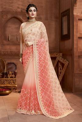 Peach embroidered net saree with blouse 1
