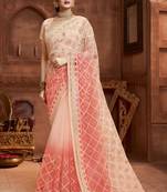 Peach embroidered net saree with blouse