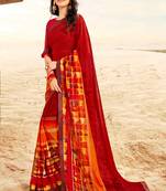 red printed georgette saree with blouse