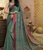 Dark green printed brasso saree with blouse