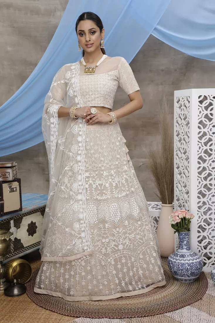 Beige embroidered net Semi Stitched bridal lehenga