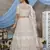 Beige embroidered net Semi Stitched bridal lehenga