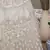 Beige embroidered net Semi Stitched bridal lehenga