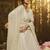 Delightful White Colored Thread and Zari Embroidered Georgette fabric designer lehenga choli for wedding and bride