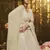 Delightful White Colored Thread and Zari Embroidered Georgette fabric designer lehenga choli for wedding and bride