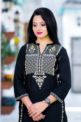 Black printed rayon kurtas-and-kurtis 4