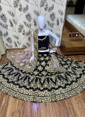 Blue embroidered velvet semi stitched bridal lehengas 1