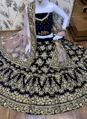 Blue embroidered velvet semi stitched bridal lehengas 2