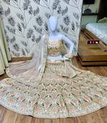 Peach embroidered satin semi stitched bridal lehengas
