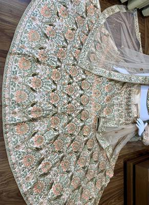 Peach embroidered satin semi stitched bridal lehengas 2