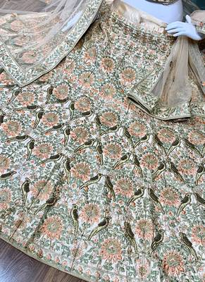 Peach embroidered satin semi stitched bridal lehengas 3