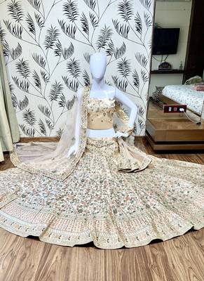 Peach embroidered satin semi stitched bridal lehengas 1