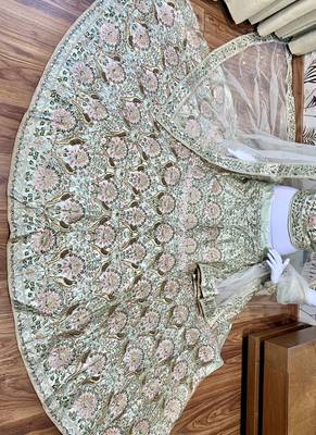 Green embroidered satin semi stitched bridal lehengas 3
