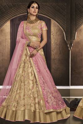 gold embroidered net semi stitched bridal lehengas 1
