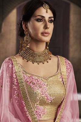 gold embroidered net semi stitched bridal lehengas 2