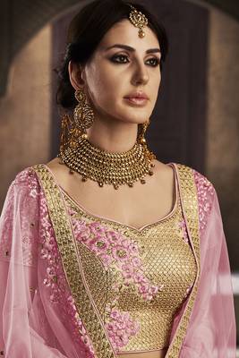 gold embroidered net semi stitched bridal lehengas 3