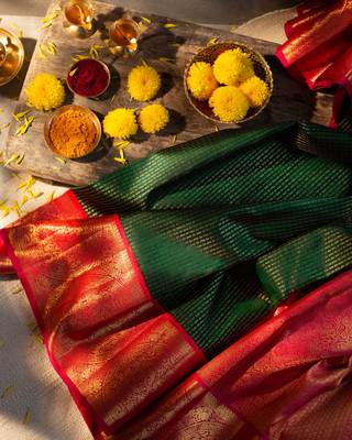 Green woven kanchipuram silk saree with blouse 1