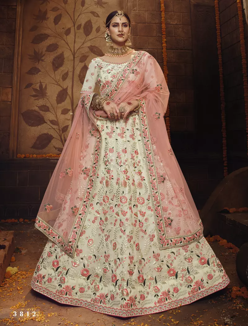 Mesmerizing Off-white colored gota, zarkan, thread and dori embroidered georgette fabric wedding Lehenga for bride