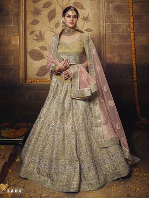Golden embroidered silk Semi Stitched bridal lehenga 1