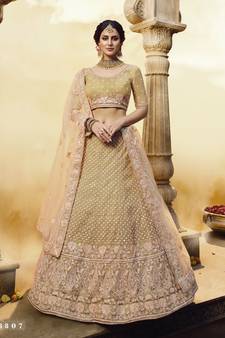 Golden embroidered silk Semi Stitched bridal lehenga
