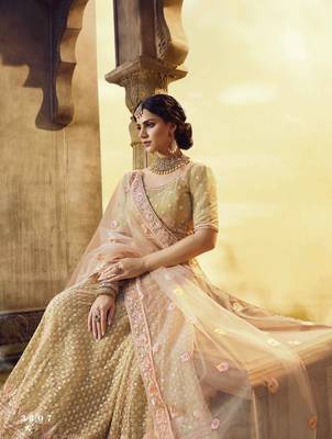 Golden embroidered Silk Semi Stitched Bridal Lehenga 4