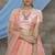 Orange thread and sequins embroidered net semi-stitched lehenga