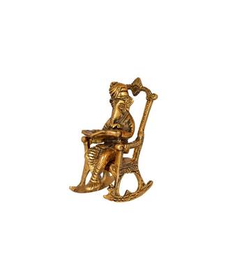 Lord Ganesha Statue Sitting on A Chair and Reading Ramayan 3