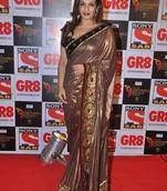 Raveena Tandon Golden and Cream Heavy saree with blouse