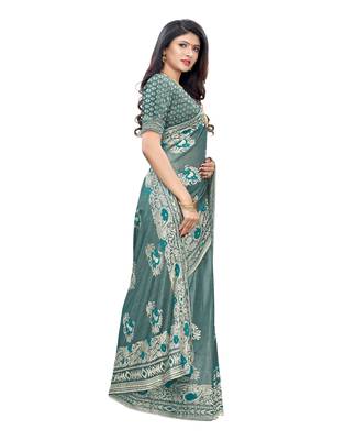 Teal woven lycra saree with blouse 2