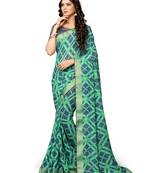 Green printed chiffon saree with blouse