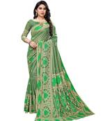 Green woven lycra saree with blouse