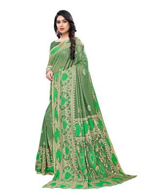 Green woven lycra saree with blouse 2