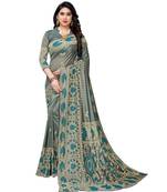 Teal woven lycra saree with blouse