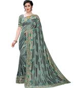 Teal woven lycra saree with blouse