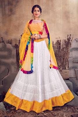 White thread embroidery net semi stitched lehenga 1