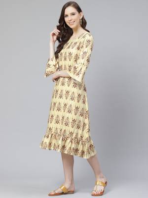 Yellow printed rayon kurtas-and-kurtis 5
