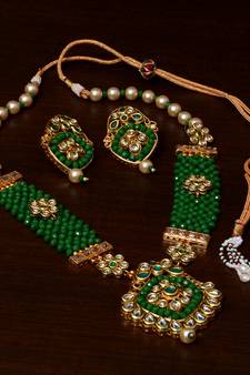 Kundan, Pearls and Green Beads Embellished Designer Necklace Set 317FNN184
