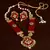 Kundan, Pearls and Maroon Beads Embellished Designer Necklace Set 317FNN181