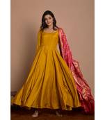 Tangerine yellow anarkali with peach gharchola dupatta