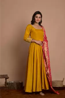 Tangerine yellow anarkali with peach gharchola dupatta