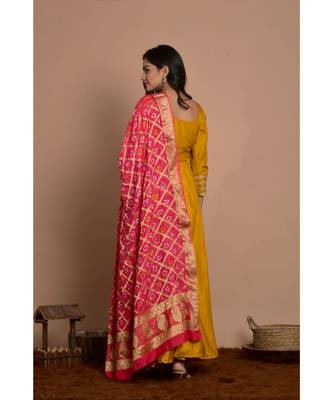 Tangerine yellow anarkali with peach gharchola dupatta 5
