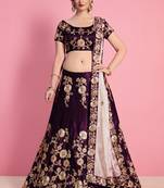 Purple embroidered velvet semi stitched lehenga