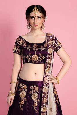 Purple embroidered velvet semi stitched lehenga 3