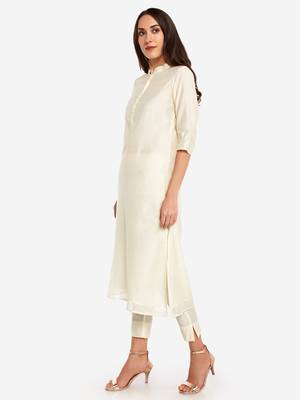 Off White kurta with Trouser. 4