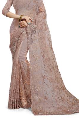 Beige embroidered net saree with blouse 2