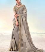 Chiku embroidered fancy fabric saree with blouse