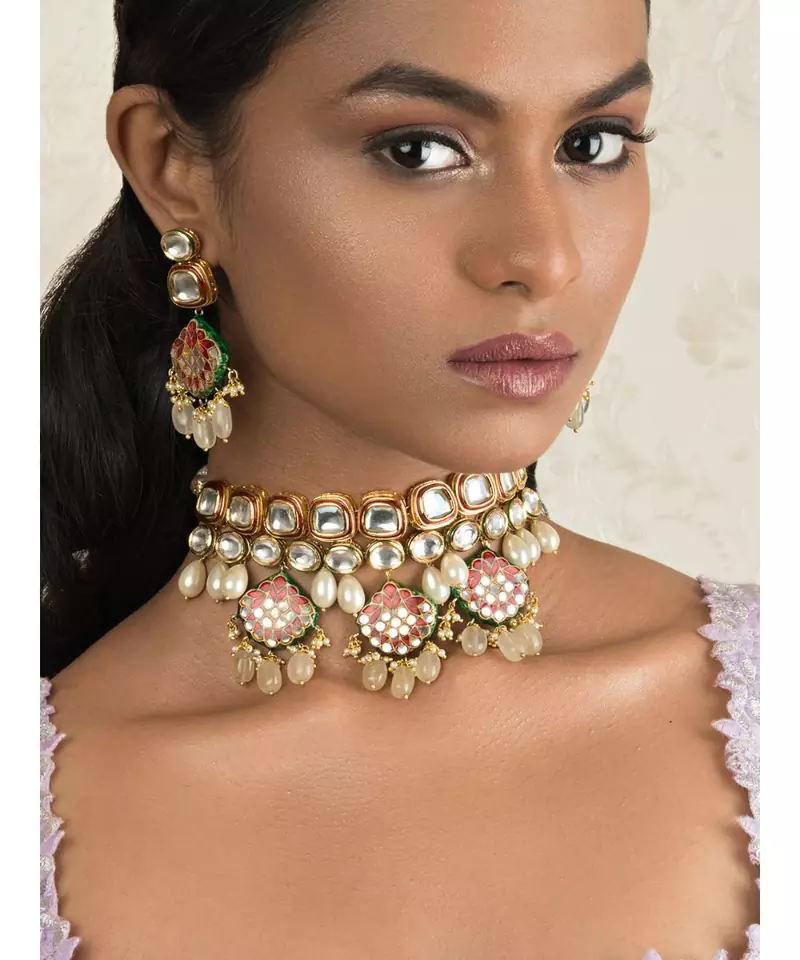 Pristine Enamelled Red And Off White Kundan Necklace And Earring Set