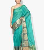Light green woven cotton silk saree with blouse