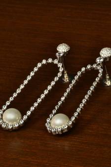 Rhodium Plated Pearl and American Diamond Embellished Dangler 216ED349