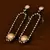 Black and Rose Gold Plated Pearl and American Diamond Embellished Dangler 216ED350